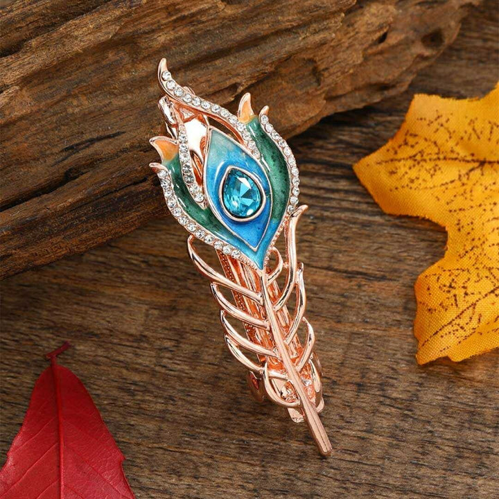 ヘアアクセサリー | 孔雀羽根とブルージルコニアのヘアアクセサリー