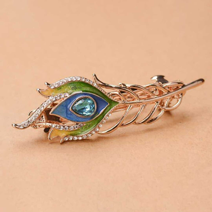 ヘアアクセサリー | 孔雀羽根とブルージルコニアのヘアアクセサリー