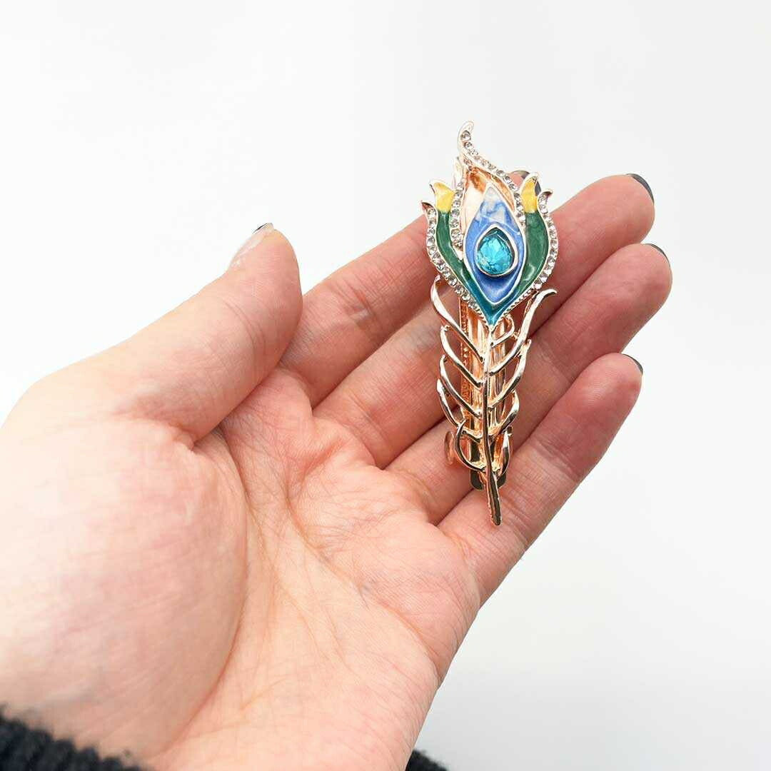 ヘアアクセサリー | 孔雀羽根とブルージルコニアのヘアアクセサリー