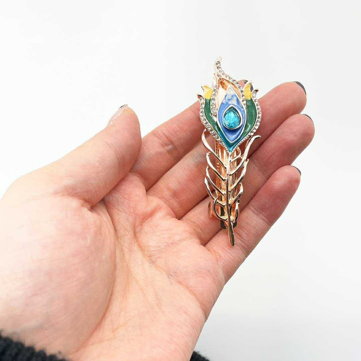 ヘアアクセサリー | 孔雀羽根とブルージルコニアのヘアアクセサリー