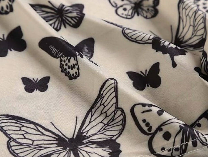 シャツ 女性 | オフホワイト バタフライ柄 ハイネックトップス