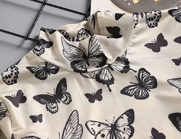 シャツ 女性 | オフホワイト バタフライ柄 ハイネックトップス