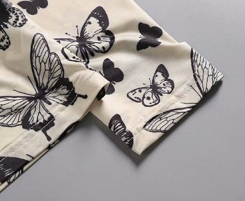 シャツ 女性 | オフホワイト バタフライ柄 ハイネックトップス