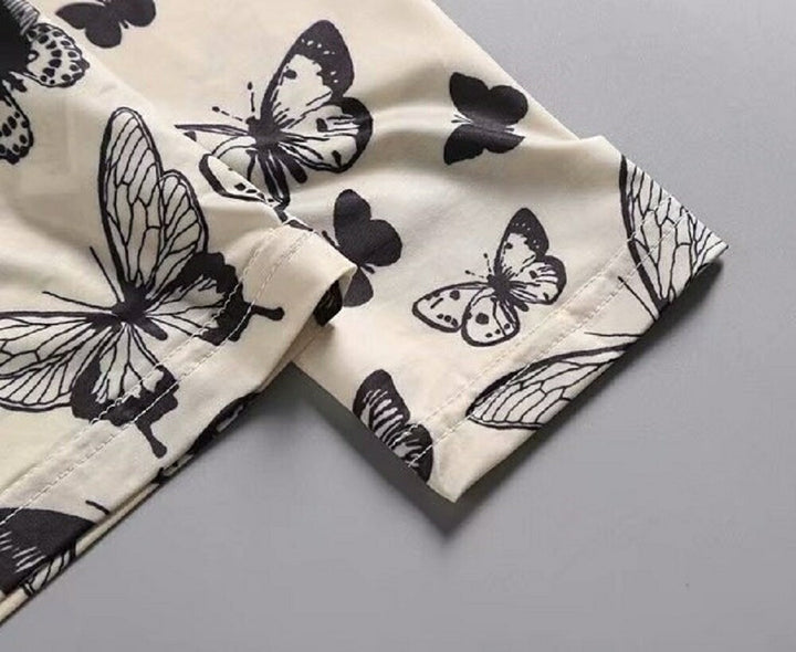 シャツ 女性 | オフホワイト バタフライ柄 ハイネックトップス